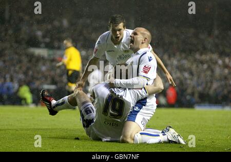 Leeds United's Ben Parker (left), Andy Robinson (right) and Jonathan Howson (centre) celebrtae after team mate Luciano Becchio (out of picture) scores the first goal Stock Photo