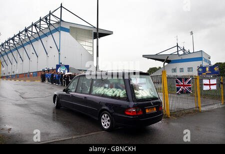 The funeral cortege of rifleman Adrian Sheldon arrives at Mansfield Town Football club on the way to his funeral service at St. Thomas's church, Kirkby in Ashfield today. Stock Photo