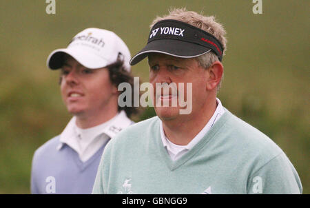 Northern Ireland's Rory McIlroy and Scotland's Colin Mongomerie on 11th fairway during the 3 Irish Open at County Louth Golf Club, Baltray, Ireland. Stock Photo