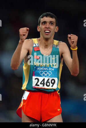 Morocco's Hicham El Guerrouj celebrates winning the 1500m final Stock Photo