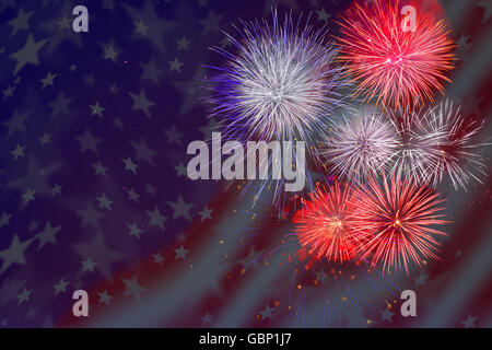 Celebration fireworks over American flag background. 4th of July beautiful fireworks. Independence Day holidays salute. Stock Photo
