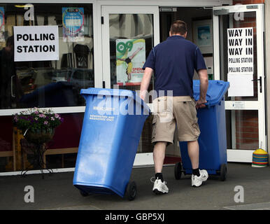 A caretaker at a polling station in Broughshane, Co Antrim, where people are voting in the European Parliamentary elections. Stock Photo