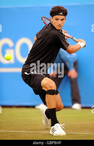2008 Junior Wimbledon Boy's winner Grigor Dimitrov from Bulgaria, in action as a wild card in the men's singles during day three of the AEGON Championships at The Queen's Club, London. Stock Photo