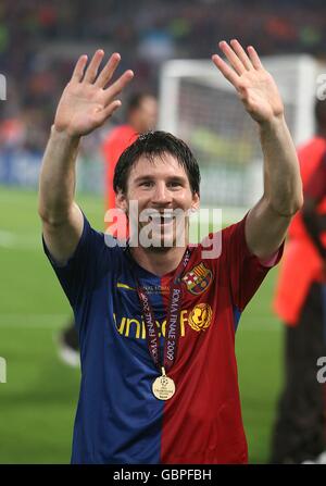 Barcelona's Lionel Messi celebrates with his winners medal Stock Photo