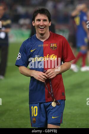 Barcelona's Lionel Messi celebrates with his winners medal Stock Photo