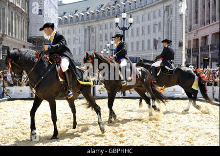 Menorcan dancing horses perform in Regent St, central London, at the Taste of Spain Festival. Thousands of visitors descended on Regent St, which was traffic free for the afternoon Fiesta. Stock Photo