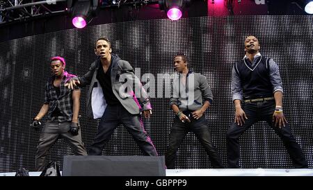 JLS (from left to right) Oritse Williams, Aston Merrygold, Marvin Humes and Jonathan Benton performing on stage during Capital 95.8 Summertime Ball with Barclaycard at the Emirates Stadium. Stock Photo