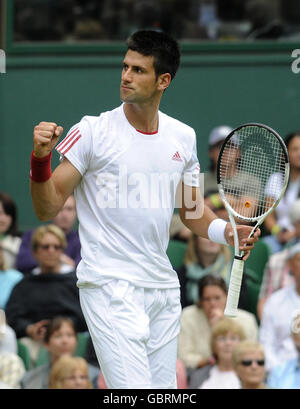 Serbia's Novak Djokovic celebrates a point during the 2009 Wimbledon Championships at the All England Lawn Tennis and Croquet Club, Wimbledon, London. Stock Photo