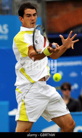 Spain Guillermo Garcia-Lopez in action against Great Britain's Andy Murray during day four of the AEGON Championships at The Queen's Club, London. Stock Photo