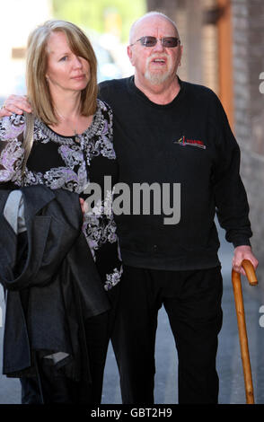 Ian McNicol (right), the father of murdered teenager Dinah McNicol, of Tillingham, Essex arrives at Chelmsford Crown Court, with his daughter Laura, Chelmesford Essex. Stock Photo