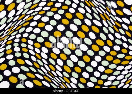 White material in yellow and white dots, a background or texture Stock Photo