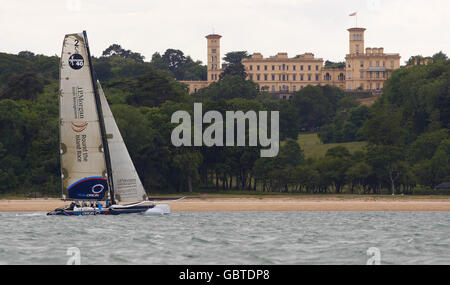 Triple Olympic gold medallist Sir Ben Ainslie gets to grips with the Team Origin Extreme 40 catamaran on the Solent, near Cowes, Isle of Wight. Stock Photo