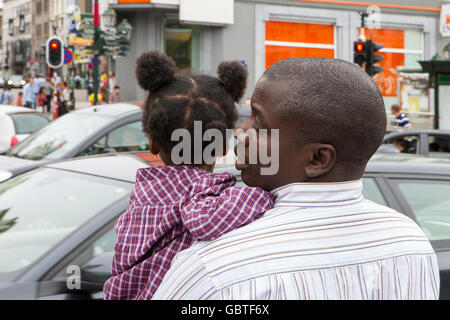 African american dad holds daughter on his shoulders Stock Photo - Alamy