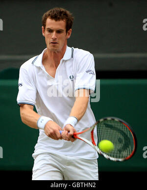 Great Britain's Andy Murray in action against Serbia's Viktor Troicki during the 2009 Wimbledon Championships at the All England Lawn Tennis and Croquet Club, Wimbledon, London.
