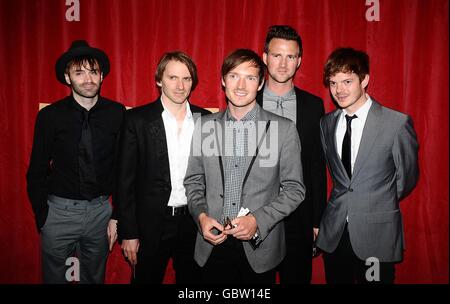Dan Gillespie Sells (centre), Paul Stewart (second right), Kevin Jeremiah (second left), Ciaran Jeremiah (left) and Richard Jones of The Feeling arriving for the European premiere of Public Enemies at the Empire Leicester Square, London. Stock Photo