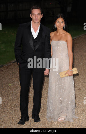 Jonathan Rhys Meyers and Reena Hammer arrives for the Raisa Gorbachev Foundation Annual Fundraising Gala Dinner at Hampton Court, Richmond upon Thames in south west London. Stock Photo