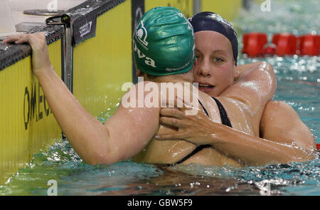 Rebecca Adlington is congratulated by Joanne Jackson (right) on her victory during the Scottish Gas National Open Swimming Championships 2009 at Tollcross Park Leisure Centre, Glasgow, Scotland. Stock Photo