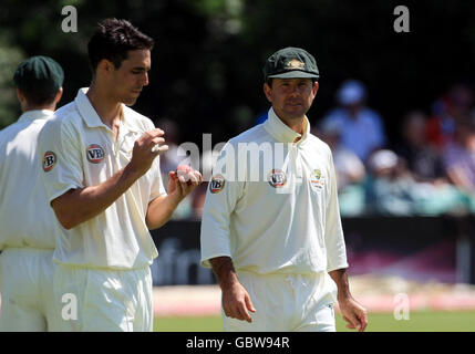 Cricket - International Tour Match - Day Two - England Lions v Australia - New Road. Australia's captain Ricky Ponting (right) advises fast bowler Mitchell Johnson during the International Tour match at New Road, Worcester. Stock Photo