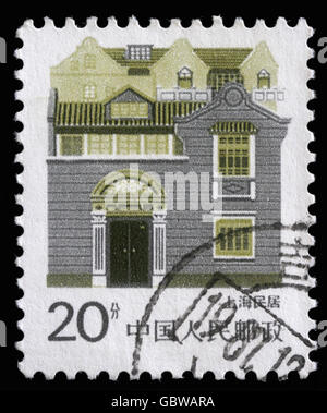 Stamp printed in China shows image of houses, series, circa 1977 Stock Photo