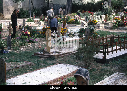 events, Bosnian War 1992 - 1995, Mostar, cemetary with one year old graves, 1994, grave, graves, death, Bosnia and Herzegovina, Yugoslavia, Yugoslav Wars, Balkans, conflict, people, 1990s, 90s, 20th century, historic, historical, mourning, mourn, loss, Additional-Rights-Clearences-Not Available Stock Photo
