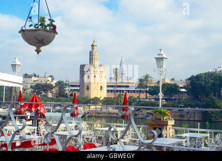 Torre del Oro and Giralda viewed from a terrace in Triana. Sevilla, Spain. Stock Photo