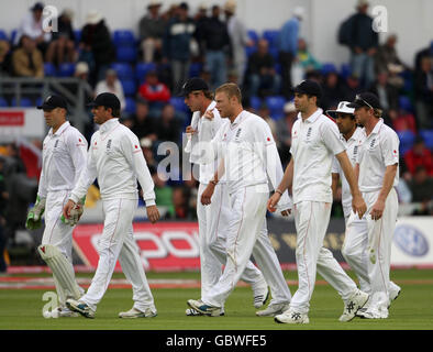 Wales' players show their dejection after conceding a try during the ...