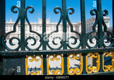 Royal Palace from the iron fence. Armeria Square, Madrid, Spain. Stock Photo