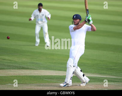 England batsman Andrew Flintoff hooks a shot but is dropped by Warwickshire's Ricki Clarke during during a a friendly match at Edgbaston, Birmingham. Stock Photo