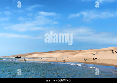 Sand dunes and beach at the Lagoon of Khenifiss (Lac Naila), Atlantic coast, Morocco. Stock Photo