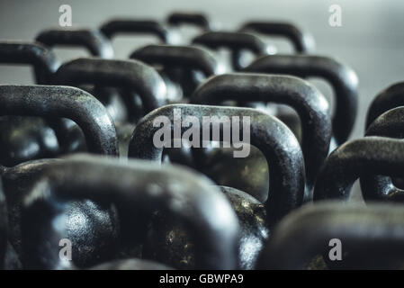 Closeup abstract photograph of kettlebells in the gym. Stock Photo