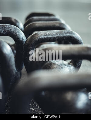 Closeup abstract photograph of kettlebells in the gym. Stock Photo
