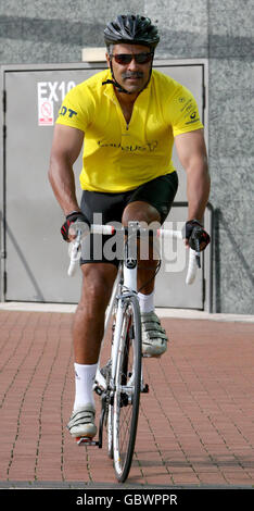 Former British Olympic athlete Daley Thompson sets off on a charity cycle ride from Manchester United's Old Trafford football ground at the beginning of the Youth Crime cycle tour. Stock Photo