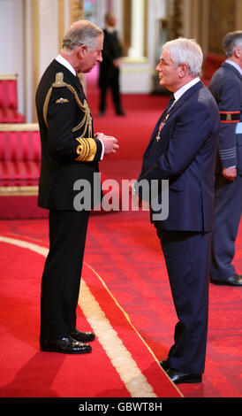 Team GB Head Boxing Coach Terry Edwards, from Orpington, is made an MBE by the Prince of Wales for services to sport, inside the Ballroom at Buckingham Palace in central London. Stock Photo