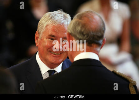 Team GB Head Boxing Coach Terry Edwards, from Orpington, is made an MBE by the Prince of Wales for services to sport, inside the Ballroom at Buckingham Palace in central London. Stock Photo