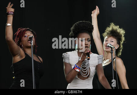 Shingai Shoniwa (centre) from The Noisettes performing on the Main Stage at the Wireless Festival in Hyde Park, central London. Stock Photo