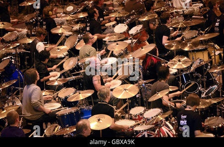 600 drummers gather at the National Indoor Arena, Birmingham, in a bid to smash the record for the most drummers to play the same beat at the same time. Stock Photo