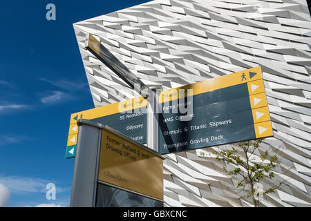 Close up of tourist sign posts at Titanic Belfast visitor centre, Northern Ireland Close up of tourist sign posts at Titanic Belfast visitor centre, Northern Ireland