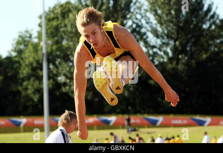 Chris Tomlinson competes in the long jump during the Aviva World Trials and UK Championships at Alexander Stadium, Birmingham. Stock Photo