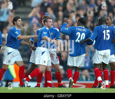 Portsmouth's David Unsworth celebrates with his teammates after scoring the first goal from the penalty spot Stock Photo