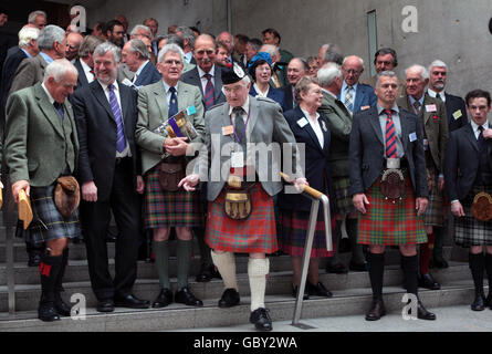Clan members outside the Scottish Parliament in Edinburgh at the Clan Convention. One hundred of Scotland's Clan Chiefs will gather for a Clan Convention as part of the Gathering weekend in the city. Stock Photo