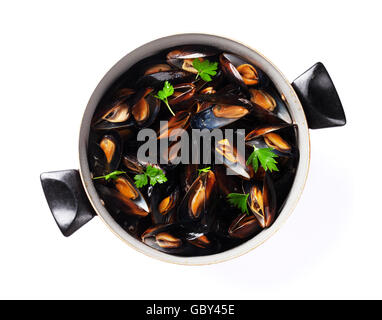 Mussels in copper pot. Isolated on white background. Top view Stock Photo