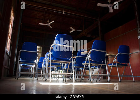 Desks are unoccupied at a new English language school in Chork village, Cambodia. Stock Photo