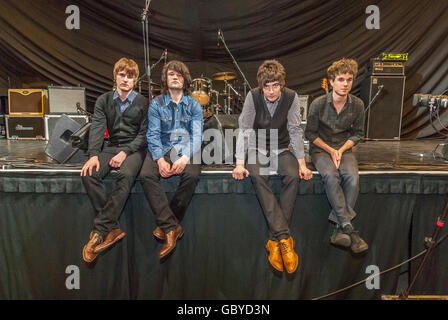 The Courteeners at the Brighton Centre.   (l to r) Daniel Moores (guitar), Michael Campbell (drums), Liam Fray (guitar, vocals)  Stock Photo