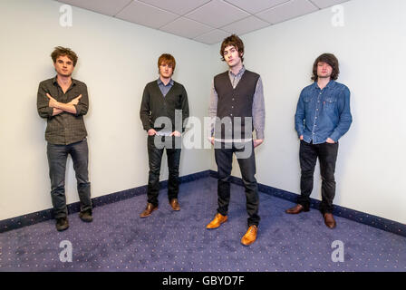 The Courteeners at the Brighton Centre.   (l to r) Mark Cuppello (bass) Daniel Moores (guitar), Liam Fray (guitar, vocals) and M Stock Photo