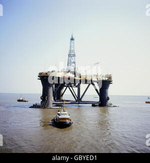 industry,oil,drilling platform on the sea,drilling platform Scarbeo 3,German Bight,circa 1970,1970s,70s,20th century,historic,historical,North Sea,drilling platform,oil rig,drilling platforms,oil rigs,Esso,Shell,swim,swimming,shaft tower,production derrick,shaft towers,production derricks,drilling derrick,wellhead,boring tower,boring trestle,drill tower,drill rig,drilling derricks,wellheads,boring towers,boring trestles,drill towers,drill rigs,platform,platforms,fixed offshore platform,crude oil,crude naphtha,raw oil,ba,Additional-Rights-Clearences-Not Available
