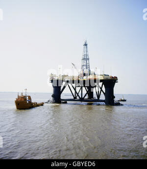 industry,oil,drilling platform on the sea,drilling platform Scarbeo 3,German Bight,circa 1970,1970s,70s,20th century,historic,historical,North Sea,drilling platform,oil rig,drilling platforms,oil rigs,Esso,Shell,swim,swimming,shaft tower,production derrick,shaft towers,production derricks,drilling derrick,wellhead,boring tower,boring trestle,drill tower,drill rig,drilling derricks,wellheads,boring towers,boring trestles,drill towers,drill rigs,platform,platforms,fixed offshore platform,crude oil,crude naphtha,raw oil,ba,Additional-Rights-Clearences-Not Available Stock Photo