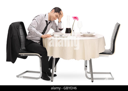 a man waiting for his date on a table reserved for two Stock Photo - Alamy