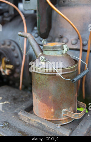 A watering can used to top up a steam engine Stock Photo