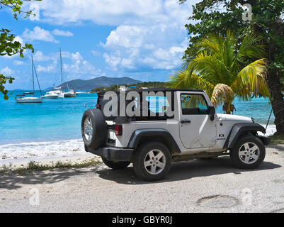 dh Cane Garden Bay TORTOLA CARIBBEAN Car hire Wrangler x Chrysler jeep parked at beach touring holiday Stock Photo