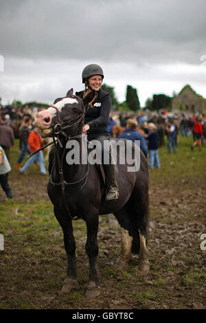 Emma Cosgrave from Tipperary with her horse at the Annual Puck Fair, in Killorglin, Co.Kerry, which takes place over the next three days. Stock Photo